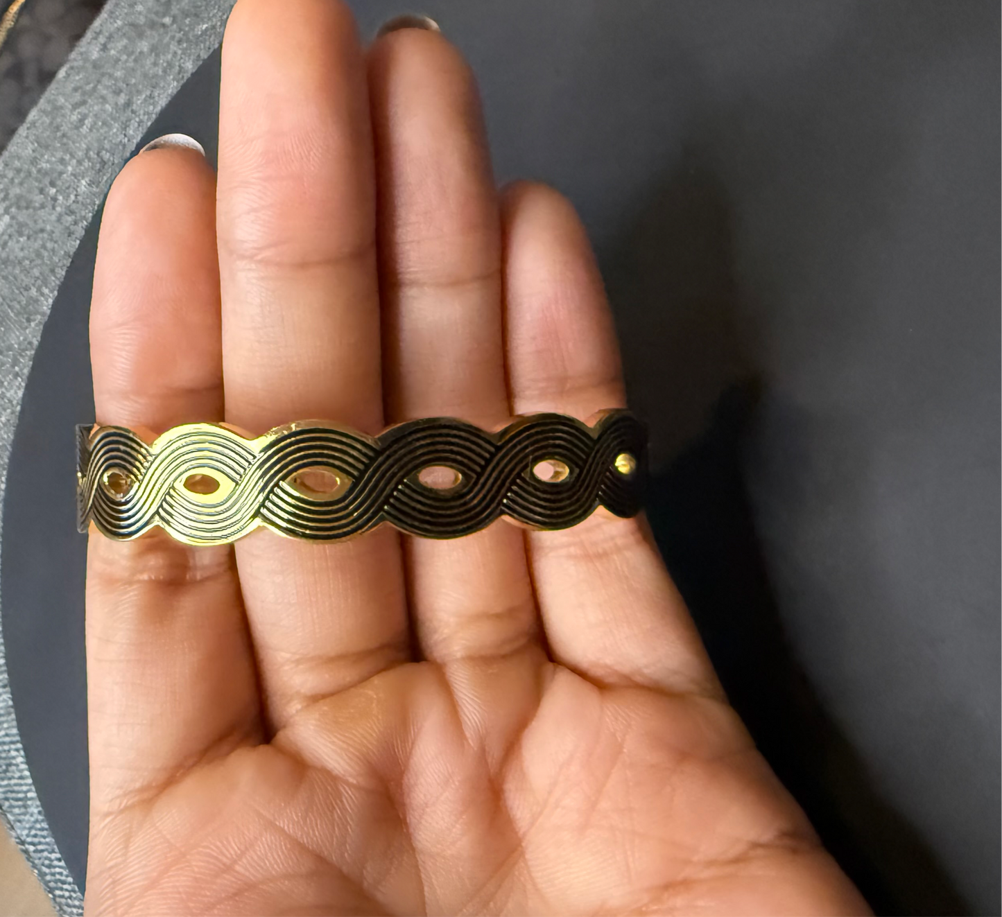 Ripplez Gold tone Wave Design