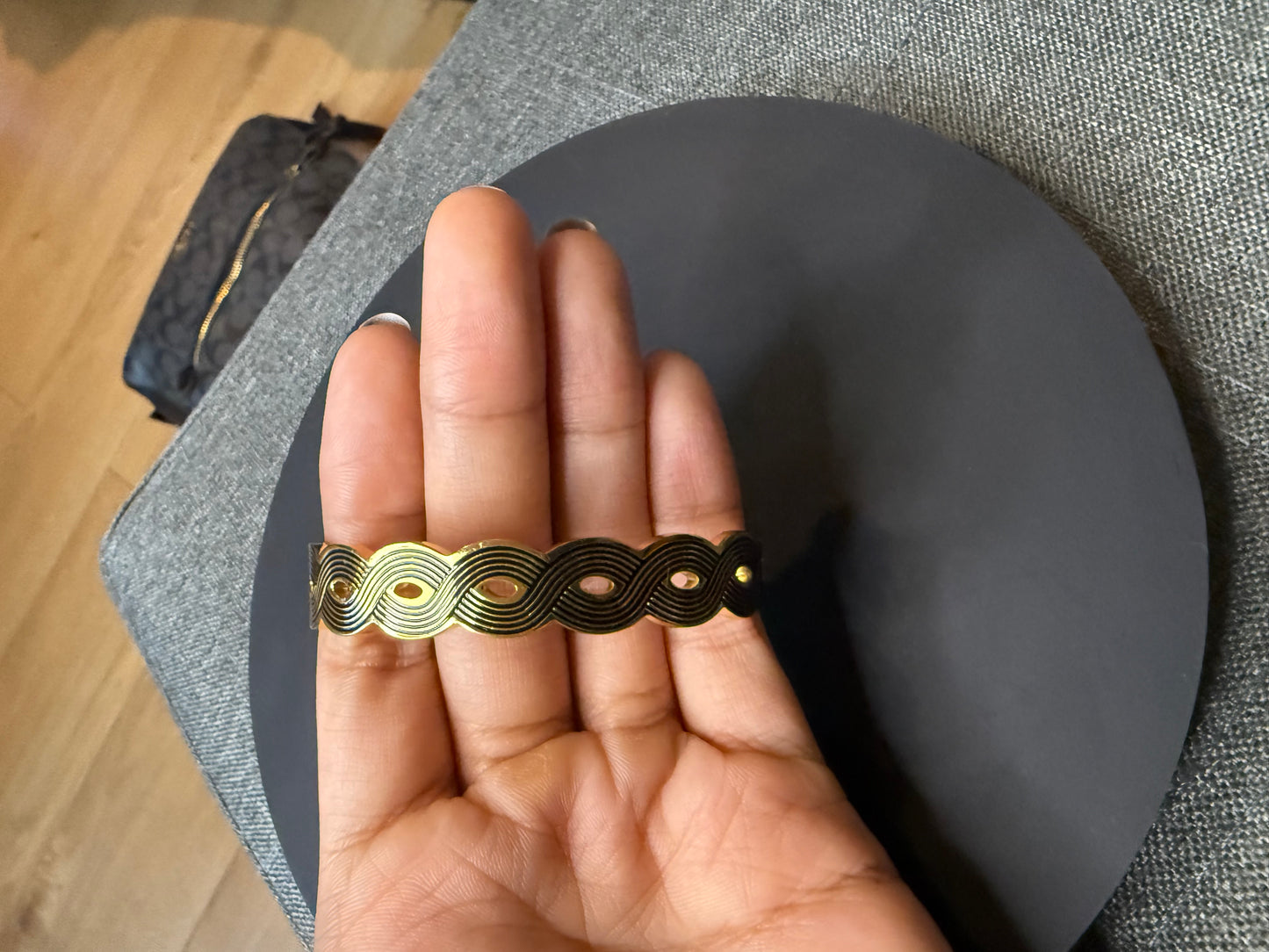 Ripplez Gold tone Wave Design